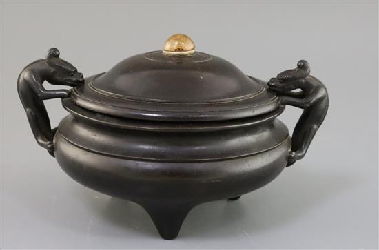 A Chinese bronze tripod censer, ding 18th century W. 25cm, jichimu cover